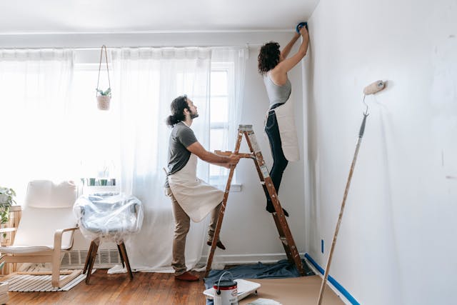 people-painting-their-home