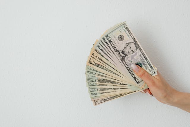 person-holding-cash